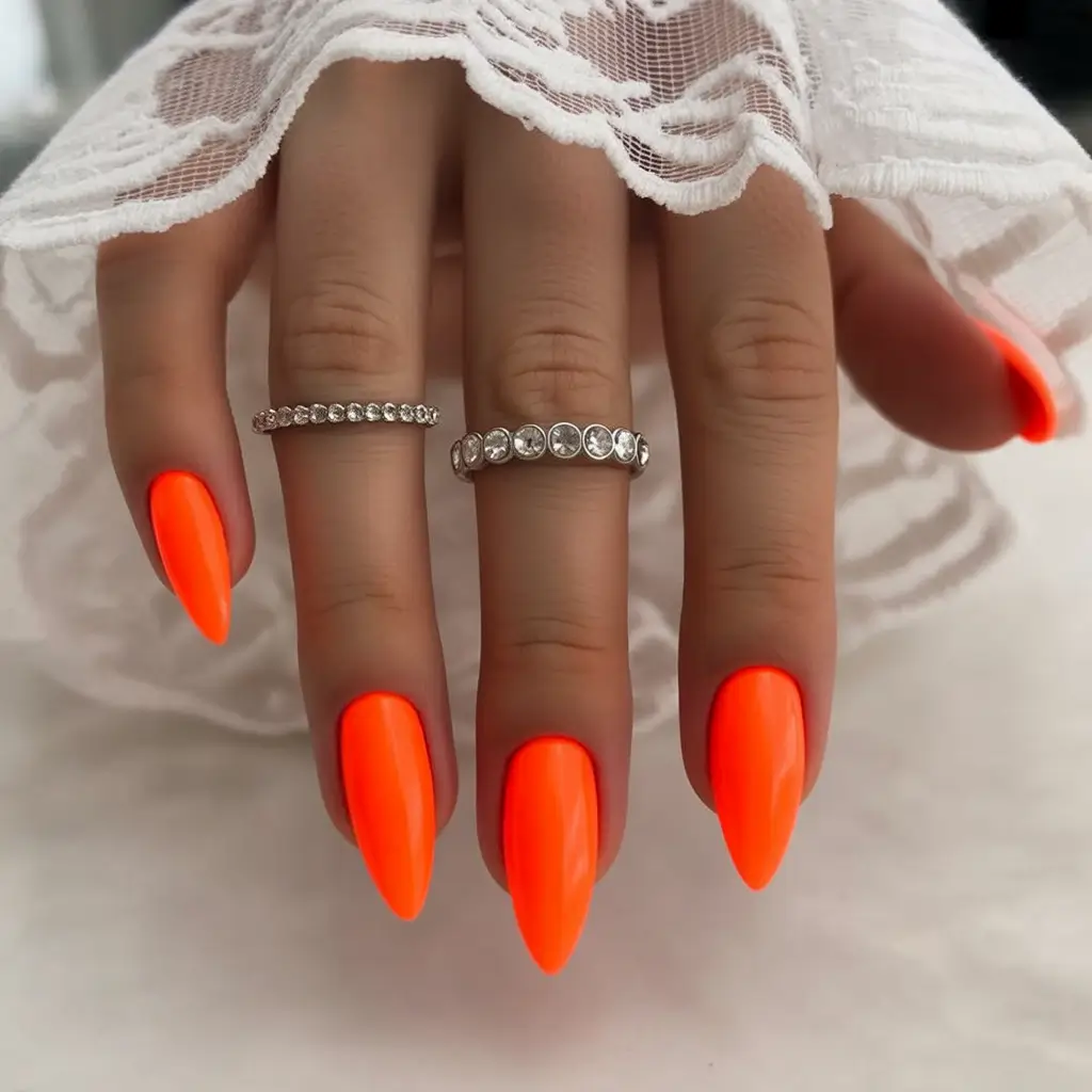 August nails color Neon Orange Stiletto Power