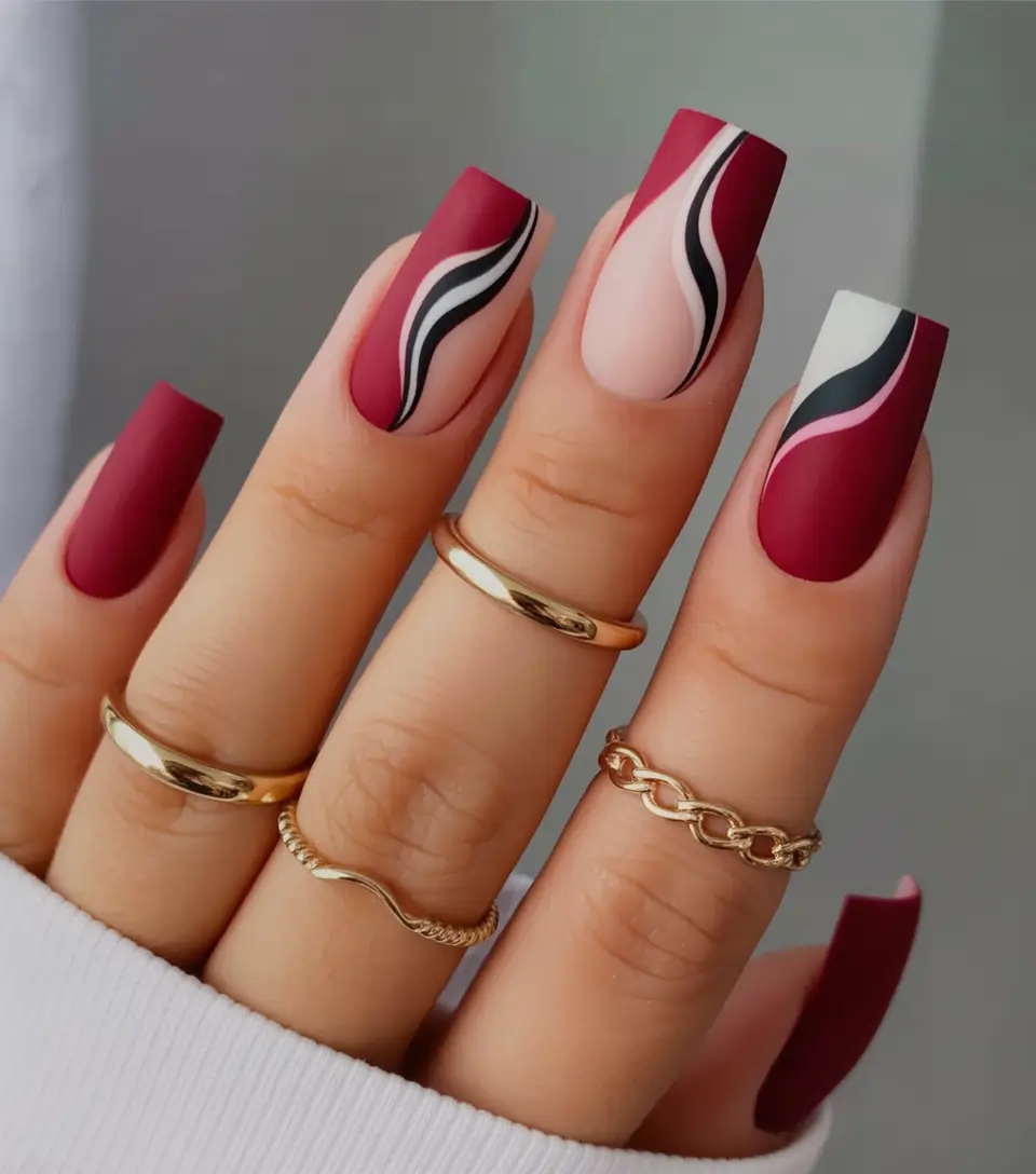 August nails color Matte Merlot with Wavy Accent Lines