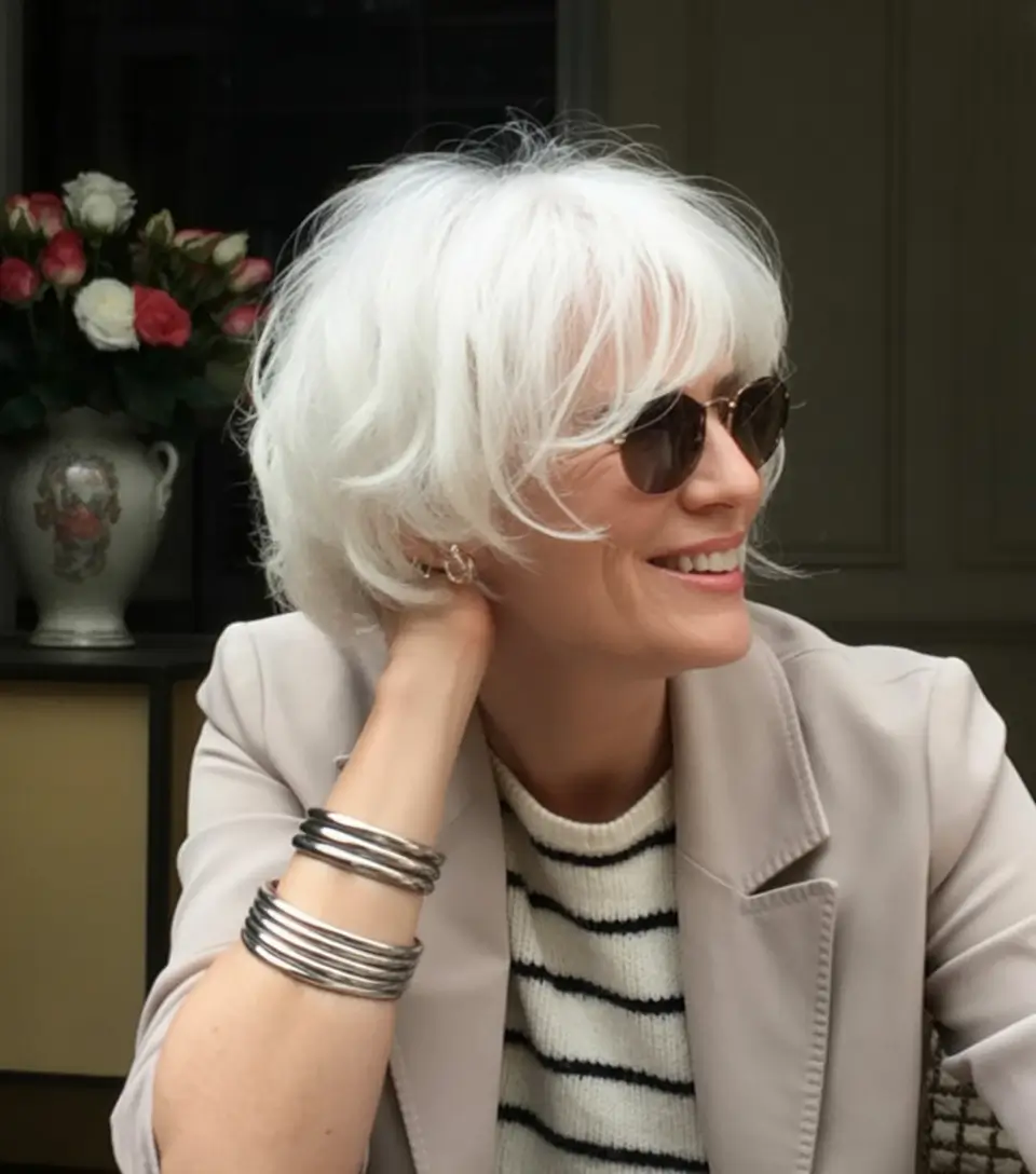 Fall hair color for women over 50+Whisper-White Bob with Tousled Fringe