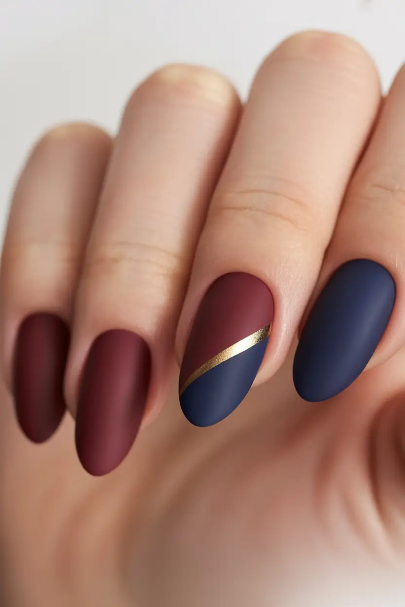 Fall Nail Color Ideas for Women Over 50 Wine and Navy with a Golden Line
