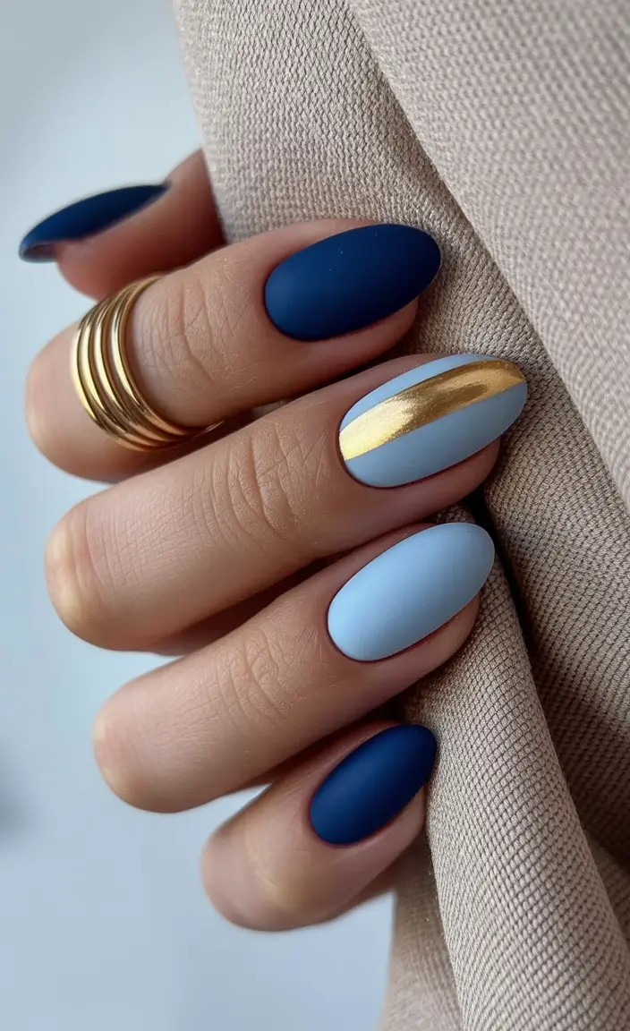 blue winter nails matte elegance with a golden twist