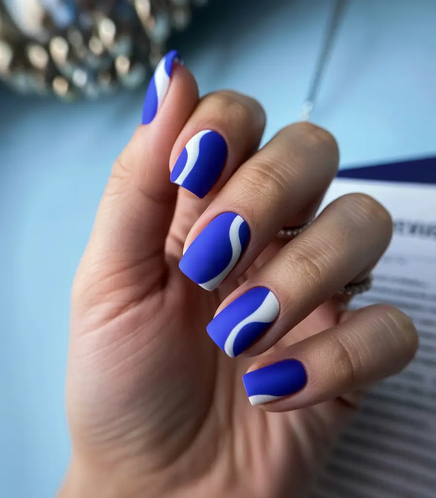 christmas nail color ideas 2025 Electric Winter Blue