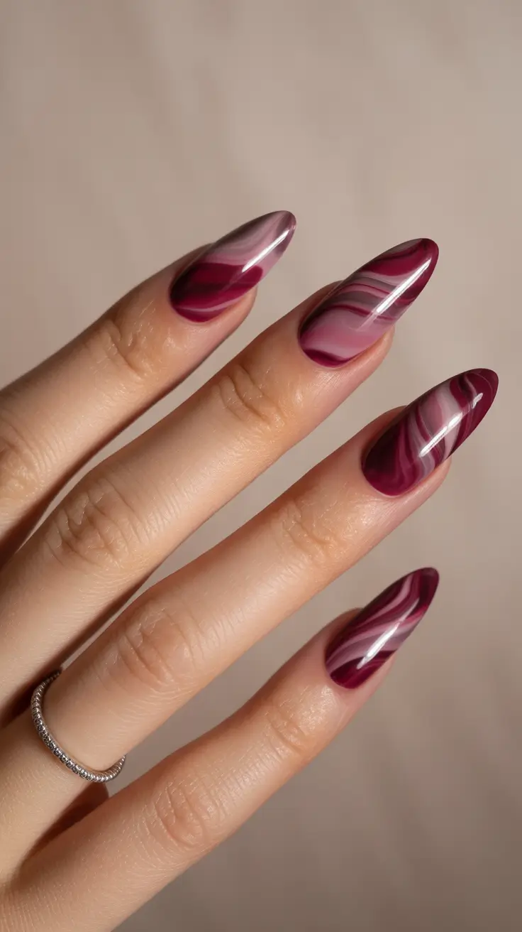 winter almond nails ideas 2025 Wine Marble Waves