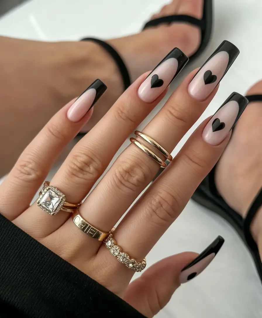 black nails Soft Nude Base With Black French Tips and Heart Art