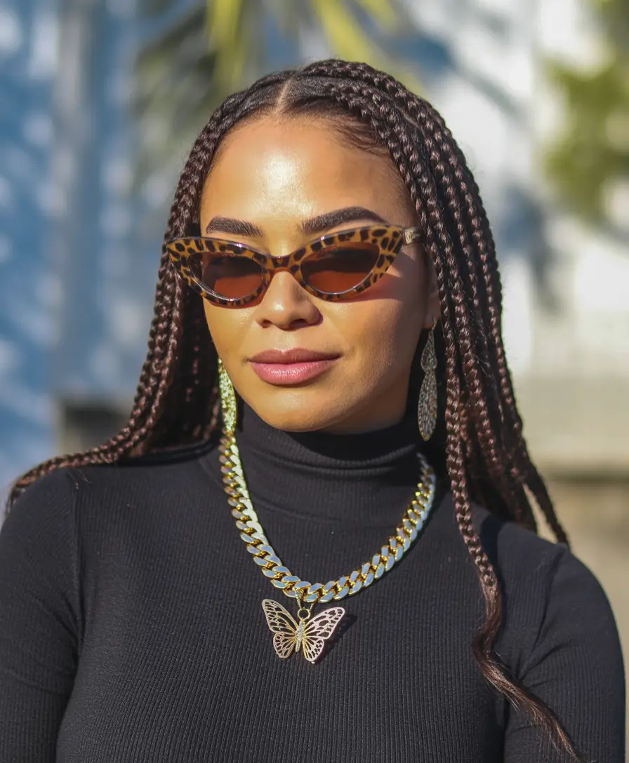 hairstyle black women Glossy Medium-Length Box Braids With Center Part