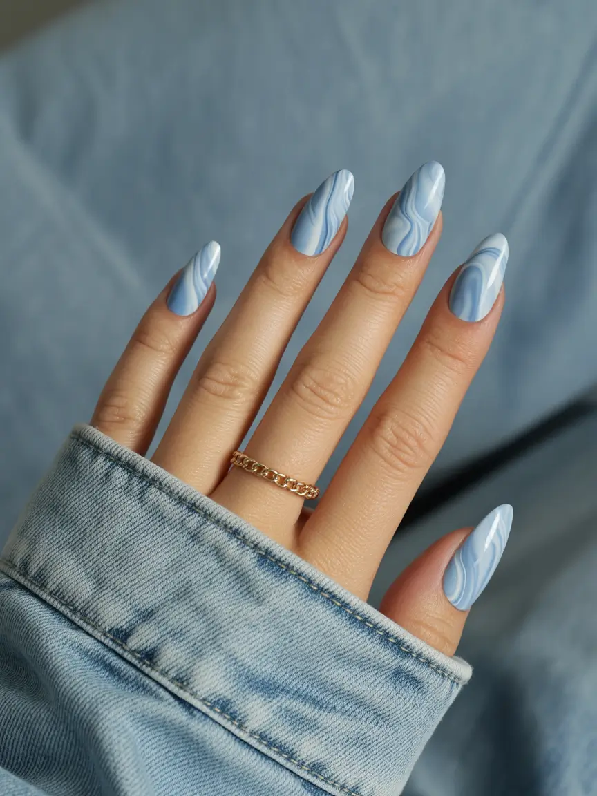 light blue nails Light Blue Marble With a Casual, Everyday Feel