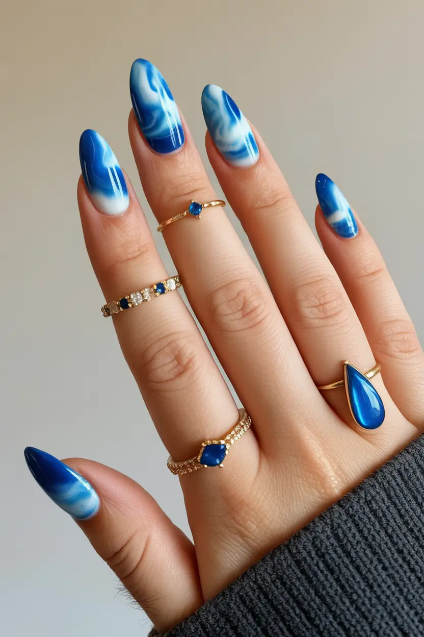 light blue nails Ocean Marble Blues With High-Gloss Depth