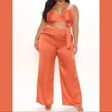 matching set Coral satin pant set. Wide leg pants with cross back crop top. Smooth and comfy. Poshmark $30