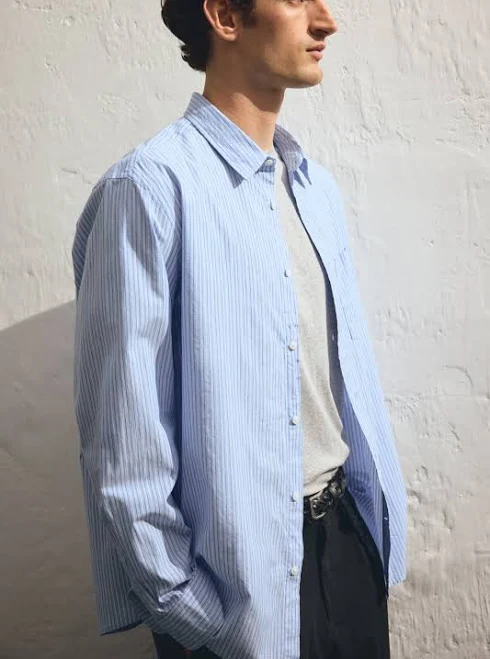 top H&M Men's Loose-Fit Striped Poplin Shirt H&M $29.99