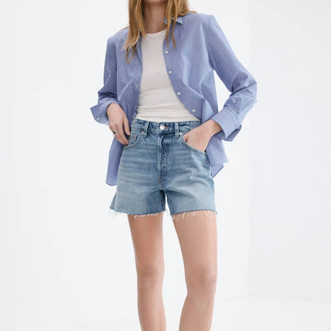 shorts MANGO Women's Frayed Hem Denim Shorts shop.mango.com $49.99