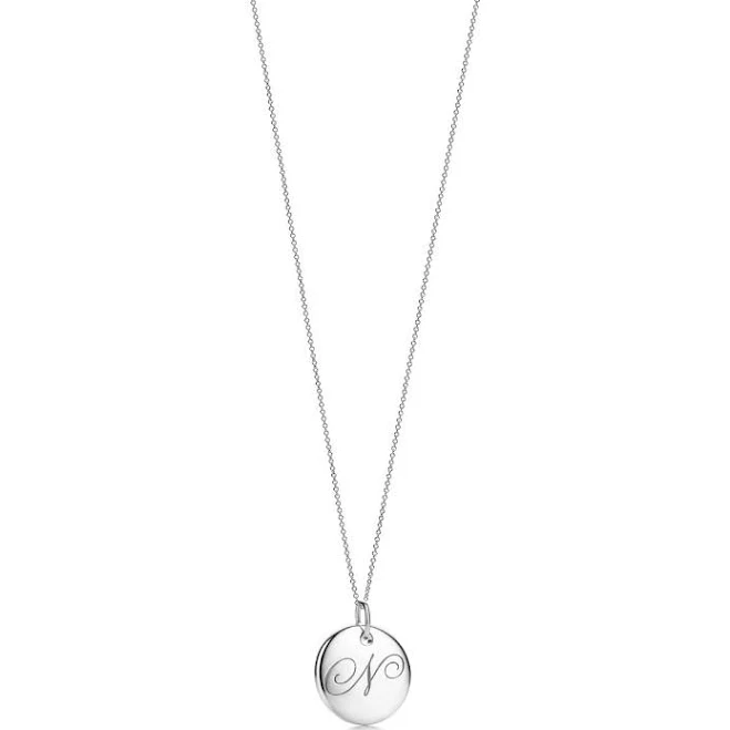accessory Tiffany Notes Letter Round Pendant Tiffany & Co. $245