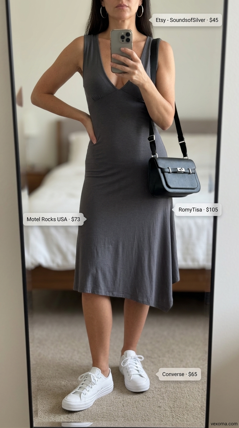Modern Grey Midi Outfit For Women Over 40 2026 Charcoal grey jersey midi dress for women over 40, a modern summer midi outfit 2026 for city exploration.