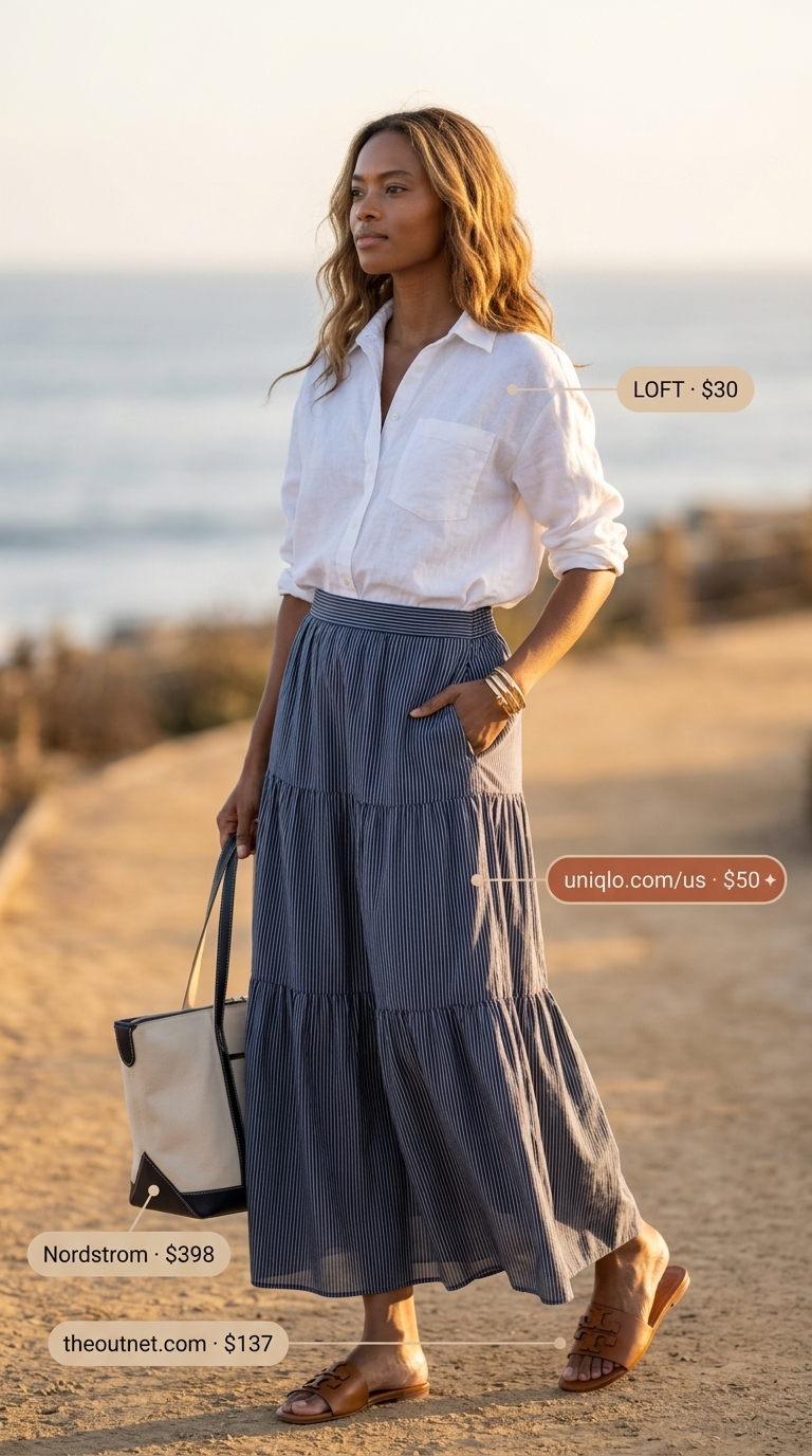 Coastal navy stripe tiered summer skirt outfits 2026 for beach vacation with white linen shirt.