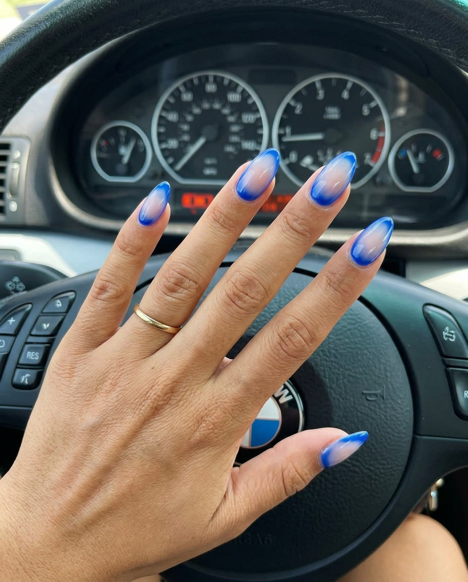 Electric Aura Almond nails featuring cobalt blue aura design, perfect for parties and concerts. Colourful summer nails 2026.