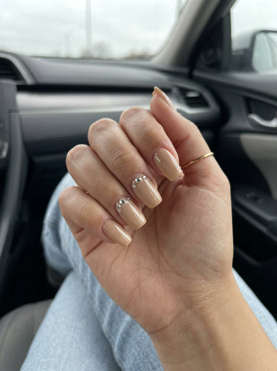 Elegant nude sparkle nails with rhinestones for formal events and date nights. Fun summer nails 2026.