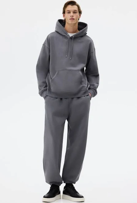 matching set H&M Men's Loose Fit Hoodie and Joggers Set H&M $49.99