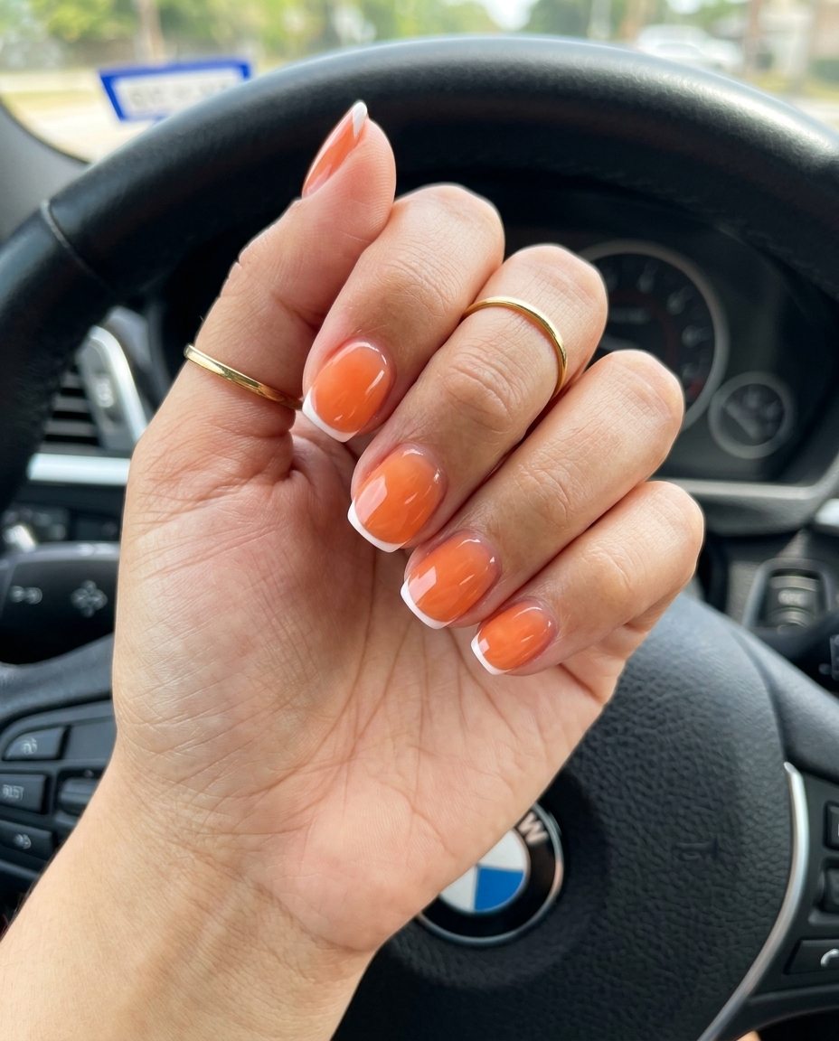 Subtle Peach Micro French: Simple short summer nails 2026. Clean peach base with delicate white French tip.