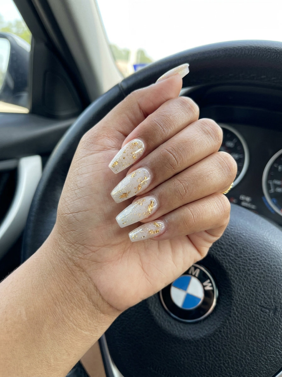 Golden hour shimmer nails for summer holiday nails 2026. Glamorous for casual outings and evenings.