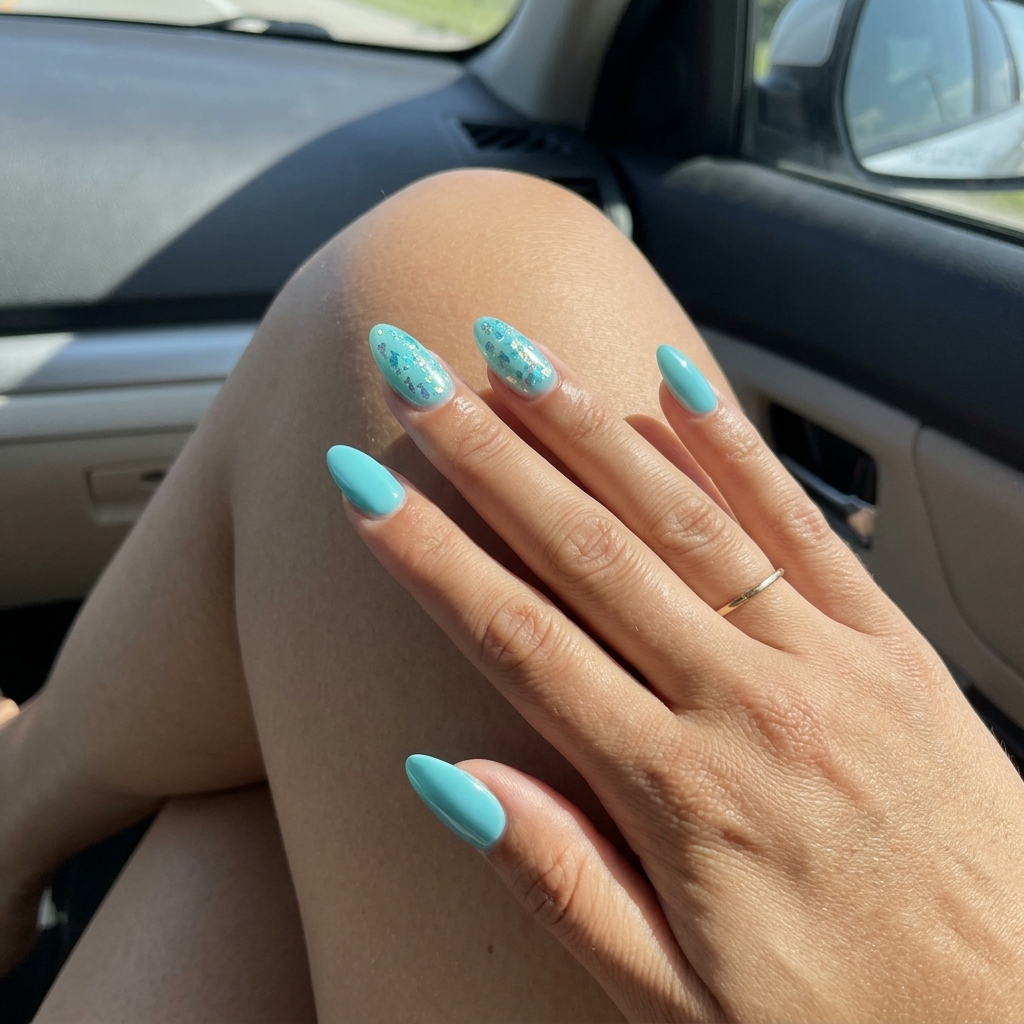 Aqua Sea Foil Accents Nails: Beachy summer vacation & casual style. Summer nail art ideas 2026.