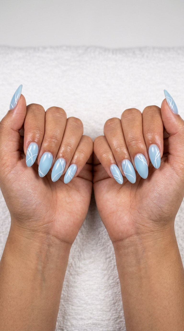 Sky Blue Milky Lines Nails 2026: Minimalist Daily Style Sky blue milky lines nails for daily wear in 2026. Clean oval minimalist style.