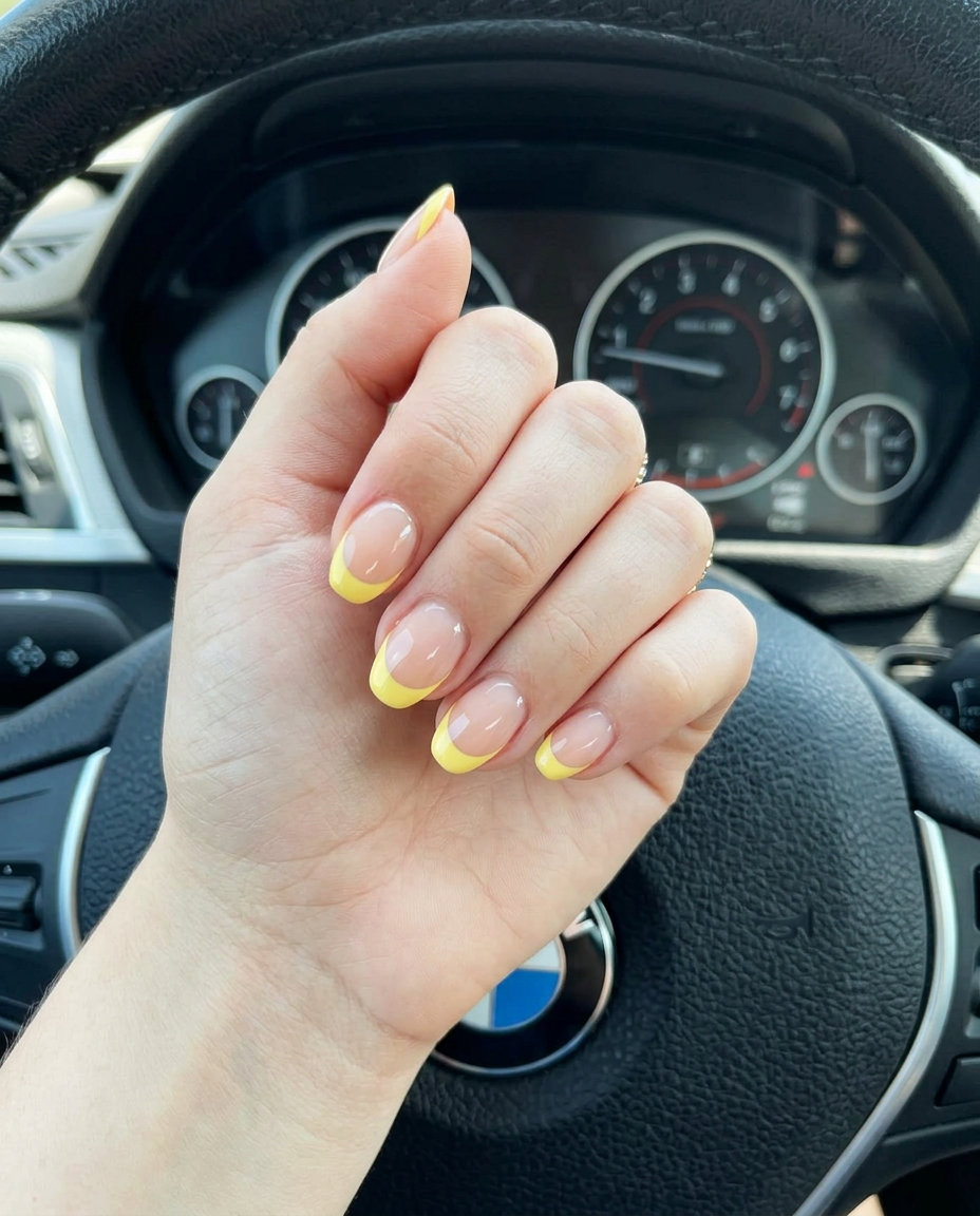 Sunny Reverse French Nails 2026 Sunny Reverse French nails for summer vibes nails 2026. Butter yellow and sheer nude for casual spring/summer events.